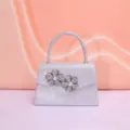 Elegant silver evening bag with sparkling rhinestone flower and pearl details for party use. - Silver