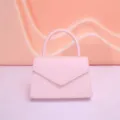 Pink leather mini handbag for women, cute top handle design for daily chic and party style. - Pink