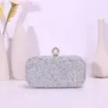 Sparkling rhinestone evening clutch bag with elegant pearl clasp for party and wedding events. - Silver