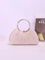 Detailed shot of the elegant pleated evening clutch bag with chic metal ring handle and clasp. - Apricot