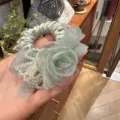 Elegant green floral hair scrunchie with sparkling crystal beads and sheer organza fabric. - Green