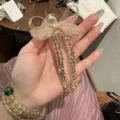 Molletta per capelli con fiocco in strass, fermaglio becco d'anatra trasparente, elegante accessorio. - Champagne