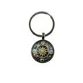 Close up view of the intricate celestial compass glass cabochon keychain pendant detail - Constellation Compass (26-2)