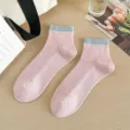 Stylish pink cotton mid-calf socks for women with contrasting blue ribbed cuffs and stripes. - One Size / Pink