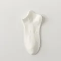 Men's solid color low cut boat socks in white with breathable mesh design for casual wear. - One Size / White