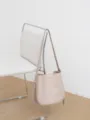 Minimalist beige leather bucket bag stylish single shoulder crossbody bag for women daily use. - Milk Tea