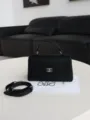 Classic black leather handbag for women, top handle shoulder crossbody bag with metallic lock. - Black