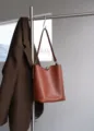 Minimalist genuine leather bucket bag for women, large capacity chic shoulder commute handbag - Brown