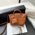 Orange Togo leather tote bag with mini pouch, stylish top handle crossbody handbag. - 31*9*20cm / Golden Auburn