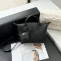 Classic black leather tote bag with top handle and chic mini pouch charm, versatile shoulder bag - 31*9*20cm / Black