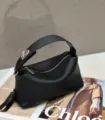 Black top-layer cowhide leather handbag, stylish soft pillow crossbody bag option. - 22x9x11cm / Black