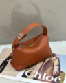 Orange genuine leather handbag, soft pillow lunch box style crossbody bag for women - 22x9x11cm / Golden Brown