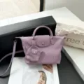 Purple genuine leather top handle shoulder bag with mini charm for women daily fashion. - 31*9*20cm / Purple