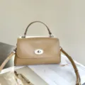 Elegante beige Ledertasche mit vintage Schloss, ideal für den täglichen schicken Look. - 24*10*15CM / Aprikose