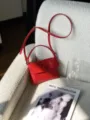 Chic red genuine leather top layer cowhide handbag, stylish button closure shoulder bag for women. - 19*3*14cm / Bright Red