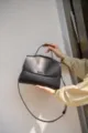 Black genuine leather top handle shoulder bag for women, stylish commuting crossbody bag. - 29x12x21cm / Black