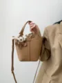 Brown Leather Bucket Bag Chic Handbag Crossbody Style with Cute Animal Charm Variant - Toasted Brown