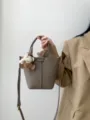 Genuine leather gray bucket bag with cute charm, stylish hand-held and shoulder crossbody bag. - Asphalt Gray