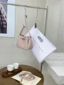 Mini pink cowhide bucket bag, stylish Kelly style handbag and crossbody bag for women casual wear. - 20*9*16cm / Pink