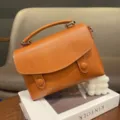 Brown leather retro top-handle handbag for women, casual crossbody bag with flap and buckles. - Sunset Yellow
