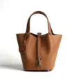 Brown leather bucket bag, top layer cowhide handbag with lock and charm for women sku - Medium 18*13*18cm / Golden Brown (Silver Buckle)