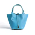 Light blue genuine leather bucket bag for women, stylish top handle handbag with lock - Medium 18*13*18cm / Northern Blue