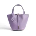 Purple genuine leather bucket bag featuring metal lock and cute smiley charm handbag variant. - Medium 18*13*18cm / Iris Purple
