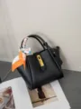 Trendy black genuine leather bucket handbag for women, featuring a stylish silk scarf handle. - 27*10*17cm / Black
