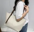 Minimalist beige leather tote bag with brown straps, ideal for daily work commuting. - 31*9*28cm / Beige Coffee