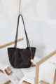 Genuine leather shoulder tote bag, large capacity brown bucket bag with cute charm for women. - Chocolate