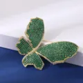 Squisita spilla farfalla strass verde tono oro lusso cristallo insetto spilla da risvolto - Verde