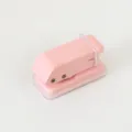 Pink mini manual single hole puncher for paper binding, portable metal stationery tool. - Macaron Pink
