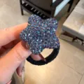 Chouchou étoile en strass scintillant avec élastique noir pour des coiffures élégantes - Violet
