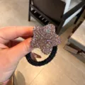 Élastique à cheveux étoile en strass scintillant avec bande noire élastique pour queues de cheval. - Champagne
