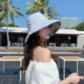 Stylish women's reversible bucket hat with wide brim, sun protection and floral inner lining. - Double-Sided Large Flower [Blue]