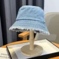 Classic blue denim bucket hat with frayed edges, vintage washed sun hat for women and girls. - Fringed Style / Light Blue