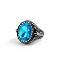 Vintage stainless steel men ring with bright blue oval glass stone and detailed wing carvings. - Size 7 / Steel Blue