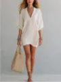 Detailed shot of the casual white v-neck loose vacation tunic top with accessories. - S / Tops / White