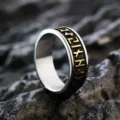 Close-up view of retro stainless steel Viking rune ring with gold and black details. - Size 9 / Style 07211 / Two-Tone Gold and Silver