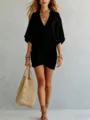 Detail shot of a black V-neck loose tunic top, perfect for resort vacation style wear. - S / Tops / Black