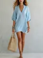 Light blue V-neck loose casual tunic top, detailed lifestyle view showing relaxed resort style. - S / Tops / Sky Blue