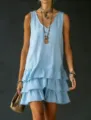 Light blue sleeveless tiered dress detail, casual V-neck styling with layered ruffles. - S / Dresses / Blue