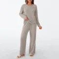 Detailed view of women casual ribbed knit lounge set featuring long sleeve top and cozy pants. - Khaki