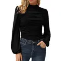 Close-up of black mock neck top with stylish ruched design and lantern sleeves. - Black