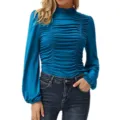 Detail shot of the solid color mock neck long sleeve ruched slim fit t-shirt showing texture. - Lake Blue