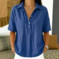 Close-up detail of blue loose short-sleeve lapel shirt showcasing soft fabric and buttons. - Royal Blue
