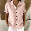 Close-up detail of women short sleeve pink button down linen shirt with lapel collar. - S / Tops / Pink