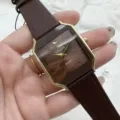 Vintage style men's quartz watch with brown leather strap and gold geometric case. - Coffee