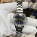 DOUKOU Damen Quarzurhr mit silbernem Stahlarmband und glitzernder Strass-Lünette. - Silbergehäuse Schwarzes Zifferblatt