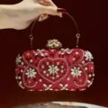 Red crystal beaded heart clutch bag for women, elegant evening party handbag with metal handle. - Red